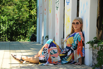 Francesca is a Naturist Massage Therapist. She is pictured lying naked, her back facing the camera