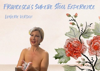 Francesca is lathering the soap with her hands in preparation to washing her clients cock and balls